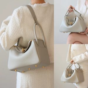 Hermes Lindy handbag in light grey leather with gold-tone hardware