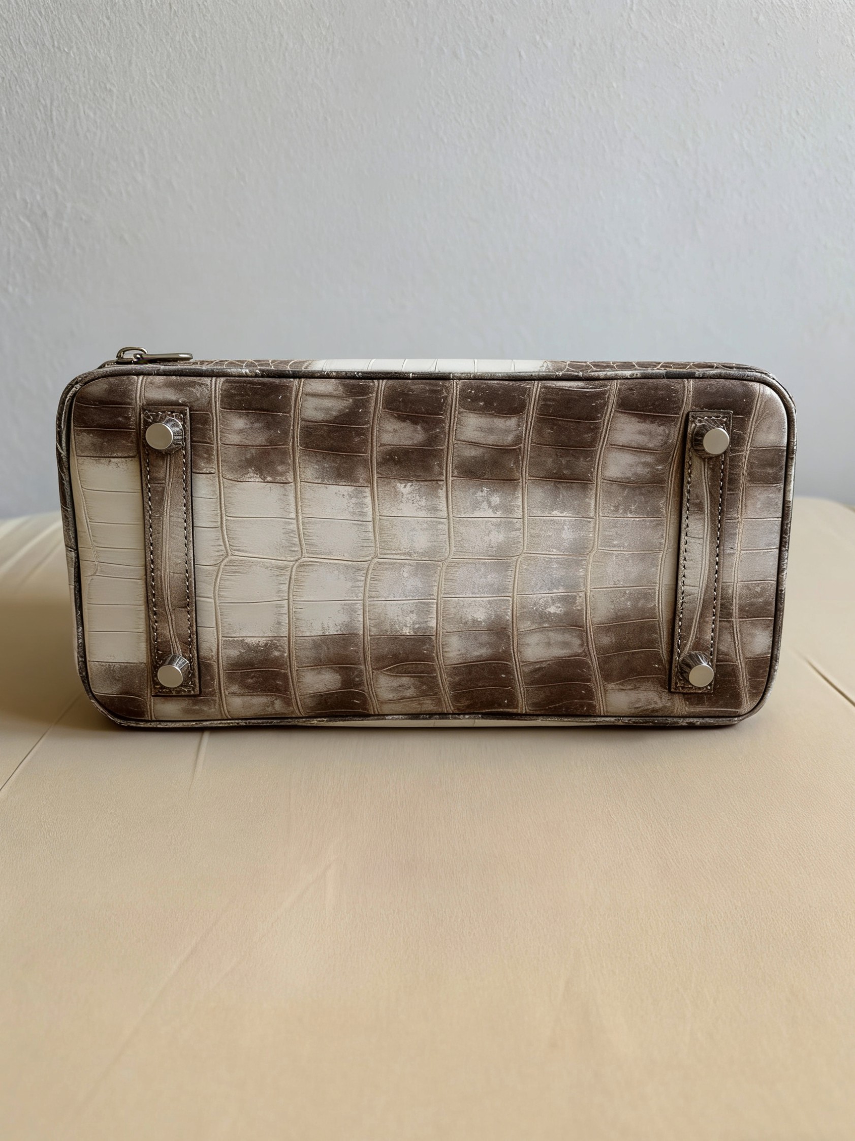 Bottom view of a custom Himalaya Birkin, showcasing the perfectly matched crocodile scale patterns