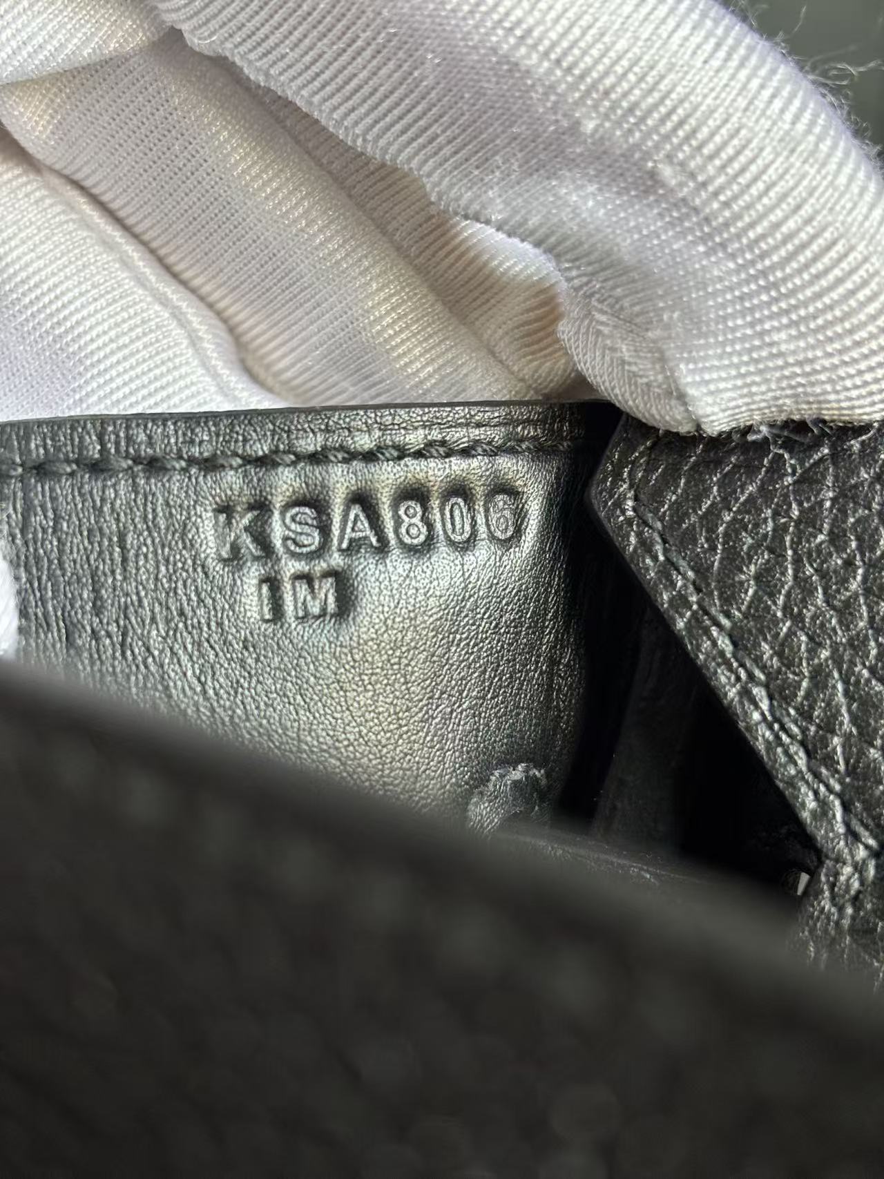 A clear view of the blind stamp (date code) inside the HAC a Dos PM