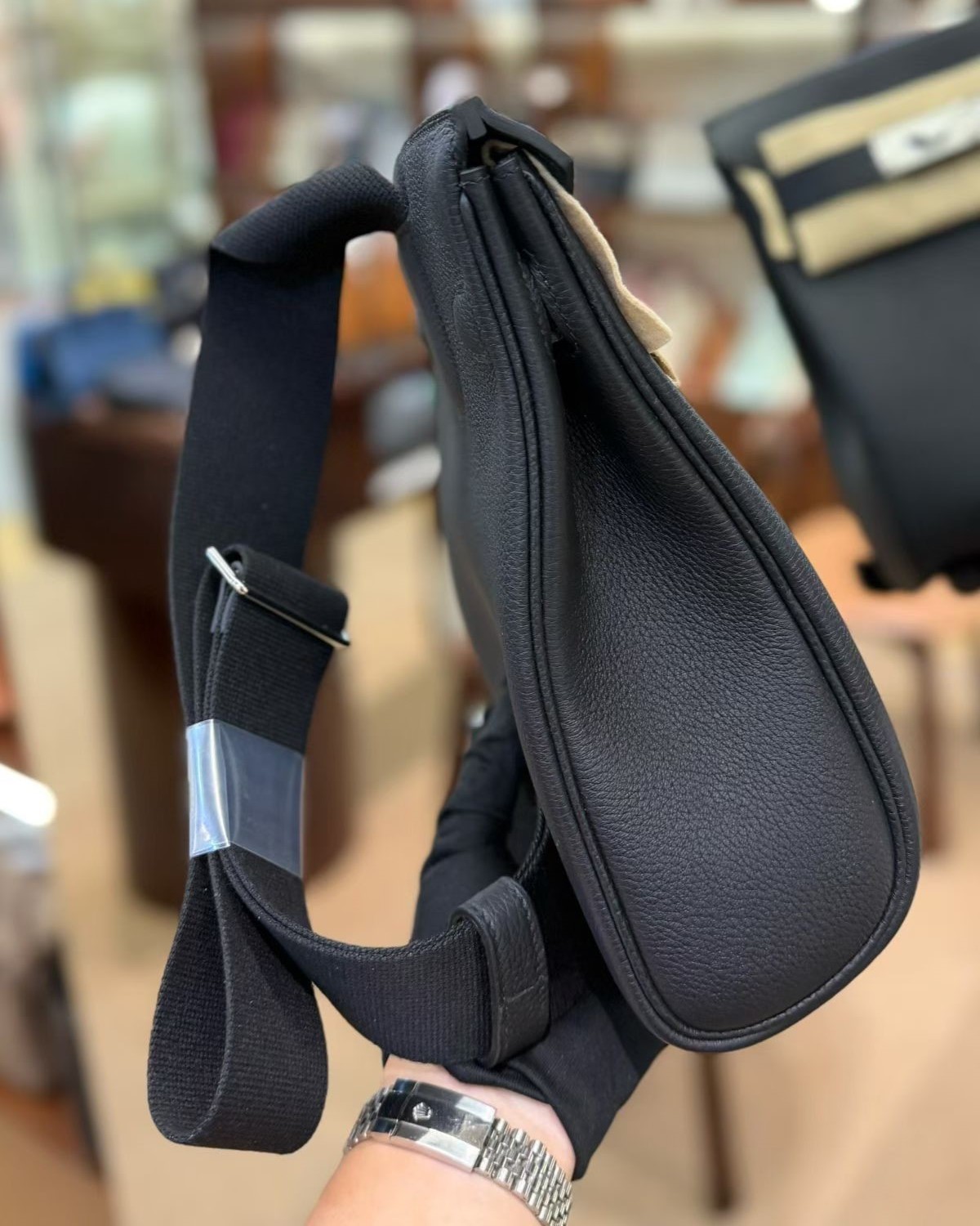 Side view of the Togo leather HAC a Dos PM, showing the naturally slouchy yet structured nature of Togo calfskin.